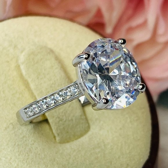 White Oval Cubic Zirconia Rhodium Over Sterling Silver Engagement Ring S… - Picture 2 of 5